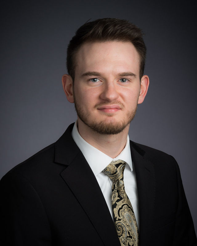 Professional headshot of Josiah Partney